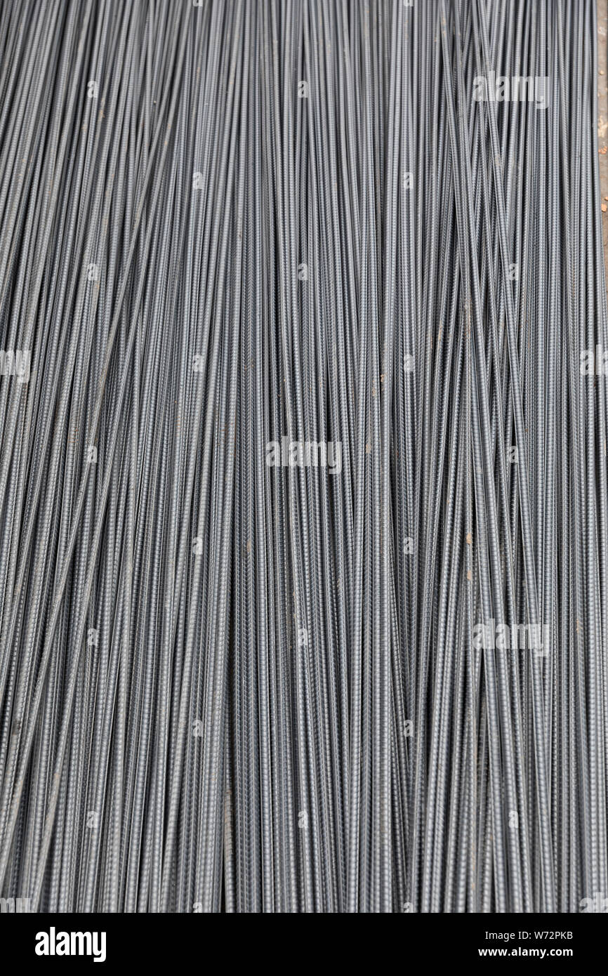 Steel Rods on a building site for reinforcing concrete.The reinforcing steel rods, absorb the tensile, shear, and compressive forces in the concrete Stock Photo