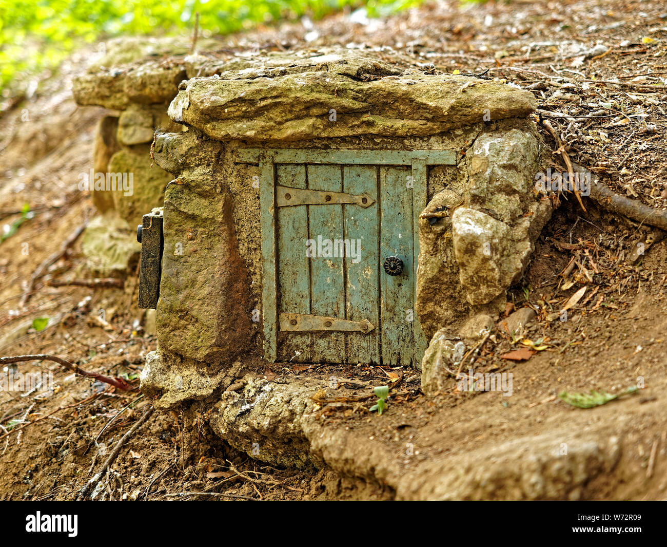 Fairy house and doors set in to the ground at the North Yorks Moors Visitor Centre at Dalby, North Yorkshire Stock Photo