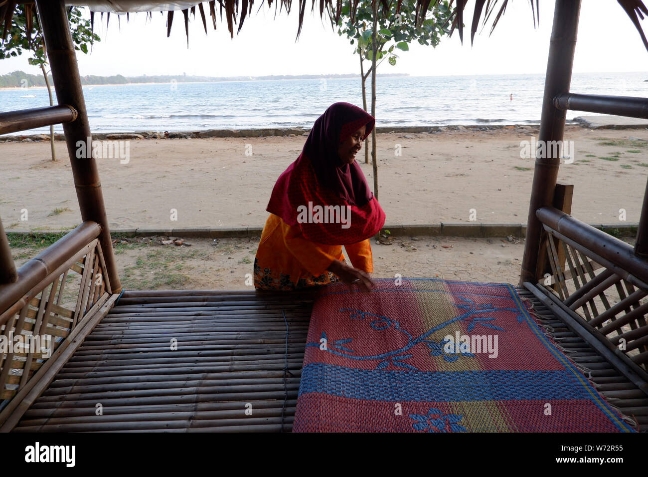 Pandegelang Banten Indonesia. 4th Aug 2019. A women cleans a