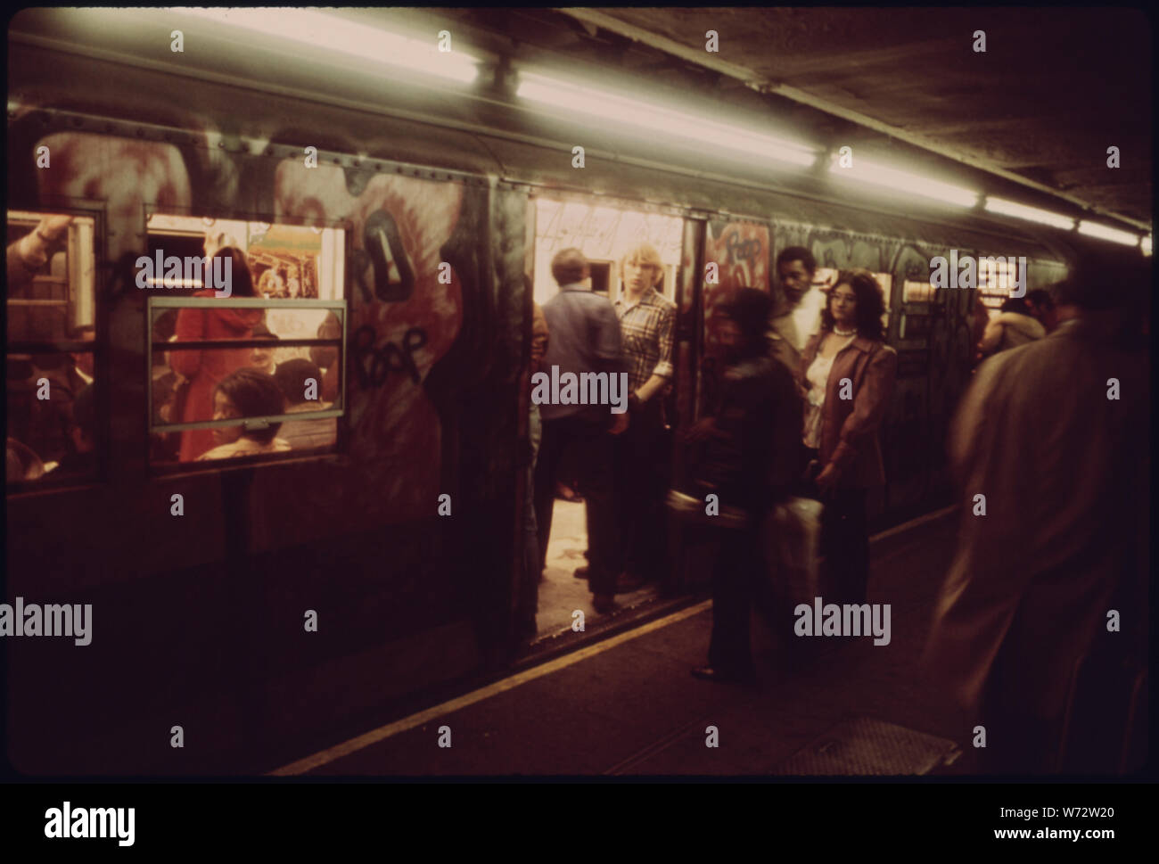 PASSENGERS BOARD THE NEW YORK CITY TRANSIT AUTHORITY SUBWAY ON THE ...