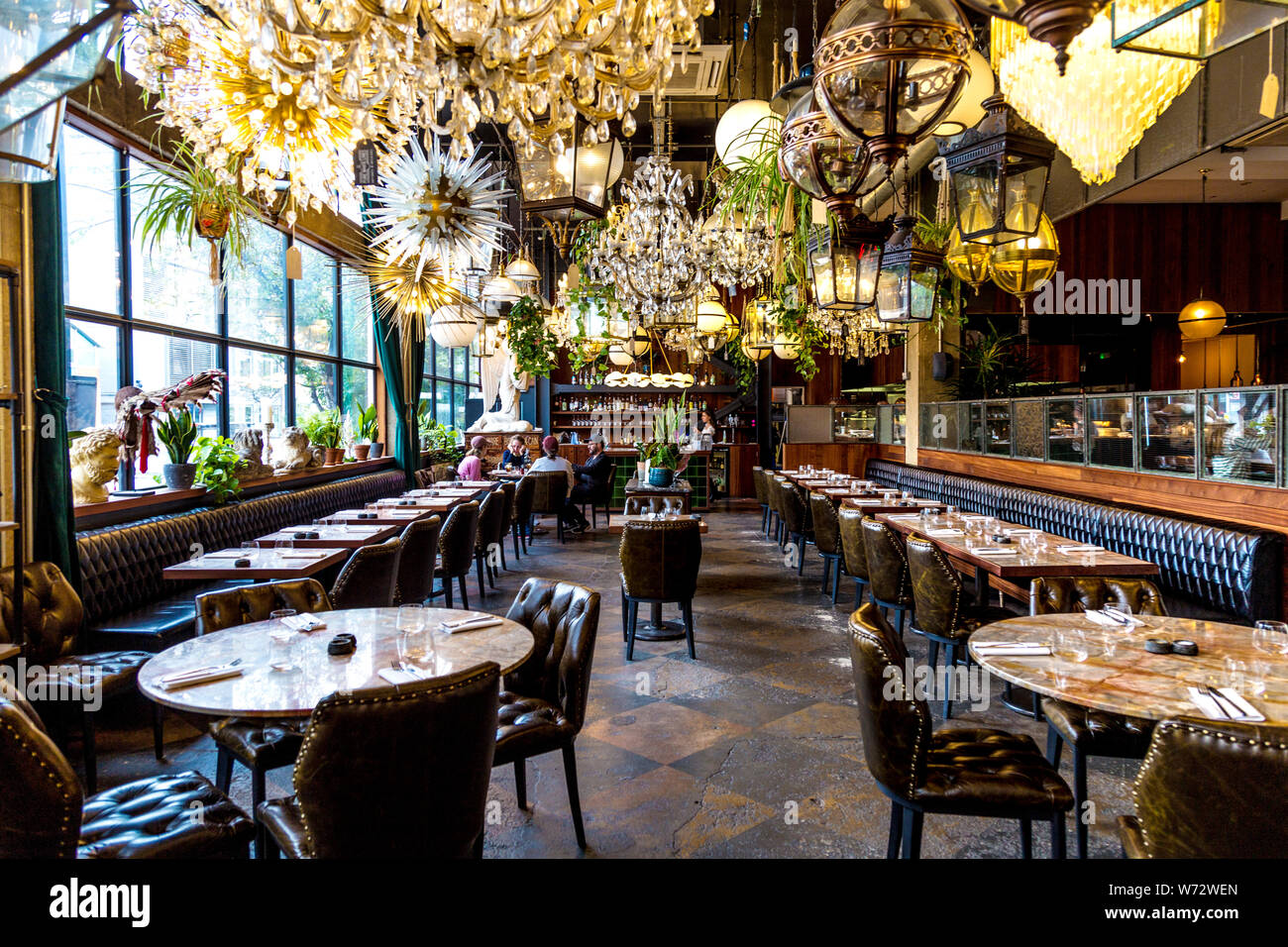 Interior of the Dining Room and Pure White Lines antique shop at Mare Street Market, Hackney, London, UK Stock Photo