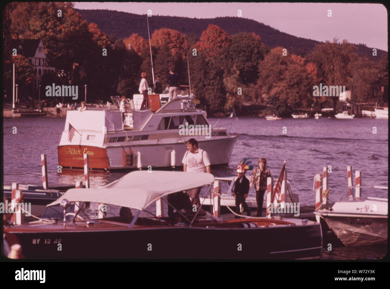 POWER BOATS AT THE DOCK INDICATES HIGH BOATING USE ON LAKE Stock