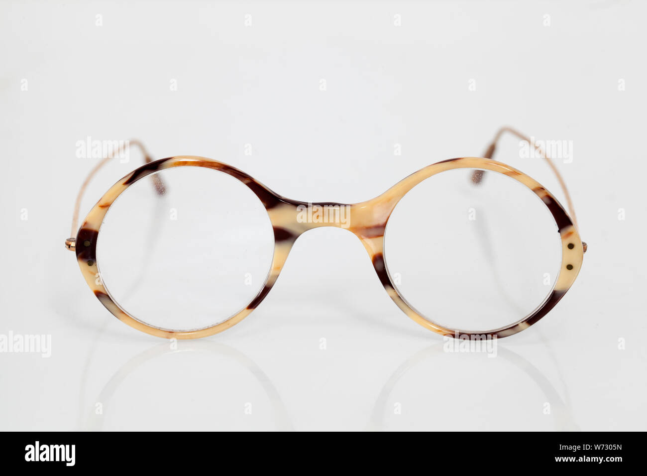 A Vintage Pair of Tortoiseshell Spectacles or Eyeglasses Stock Photo