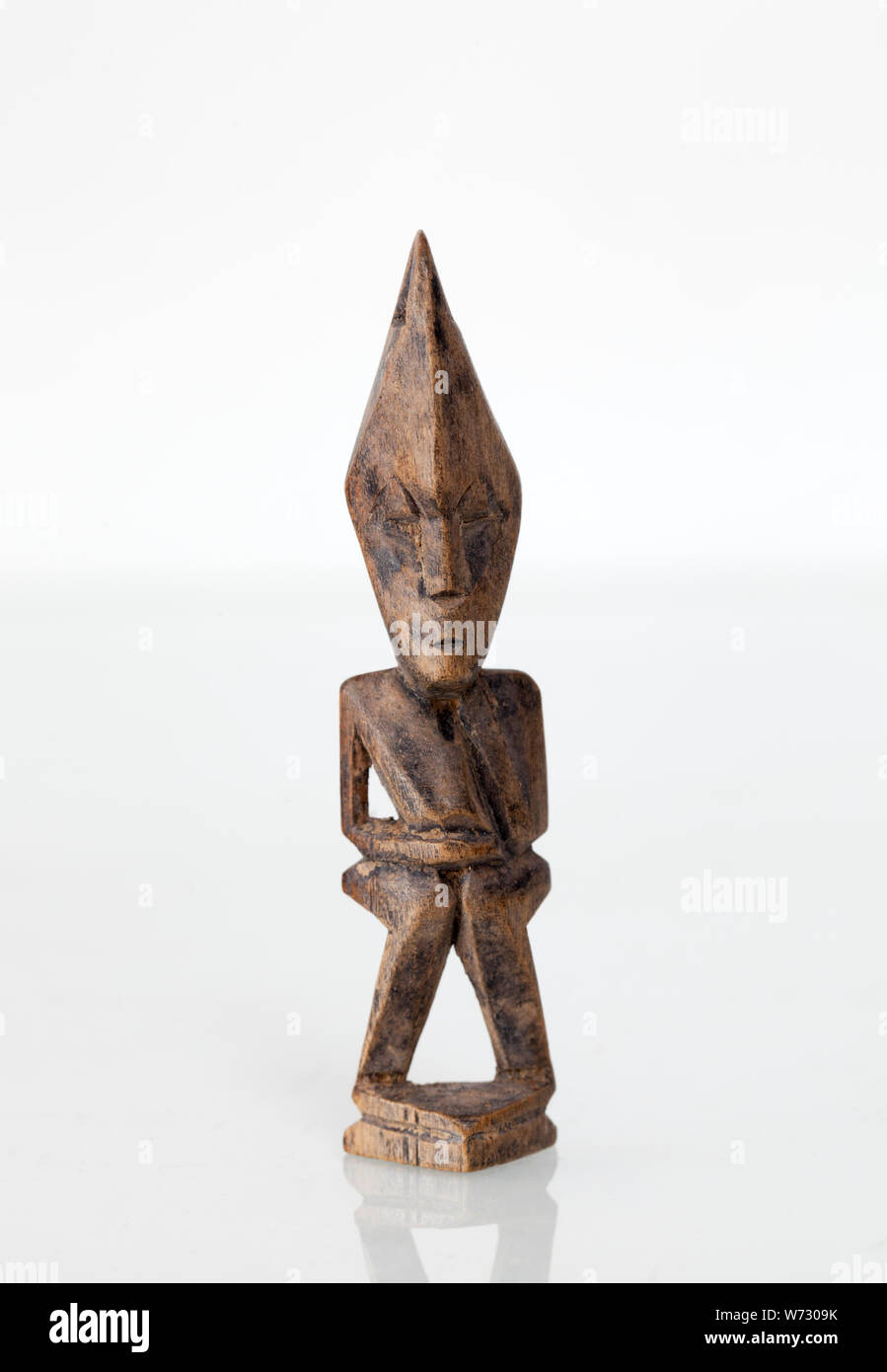 Vintage Indonesian Hand Carved Wooden Decorative Pendant - An Example of Figurative Folk Art from Lombok Stock Photo