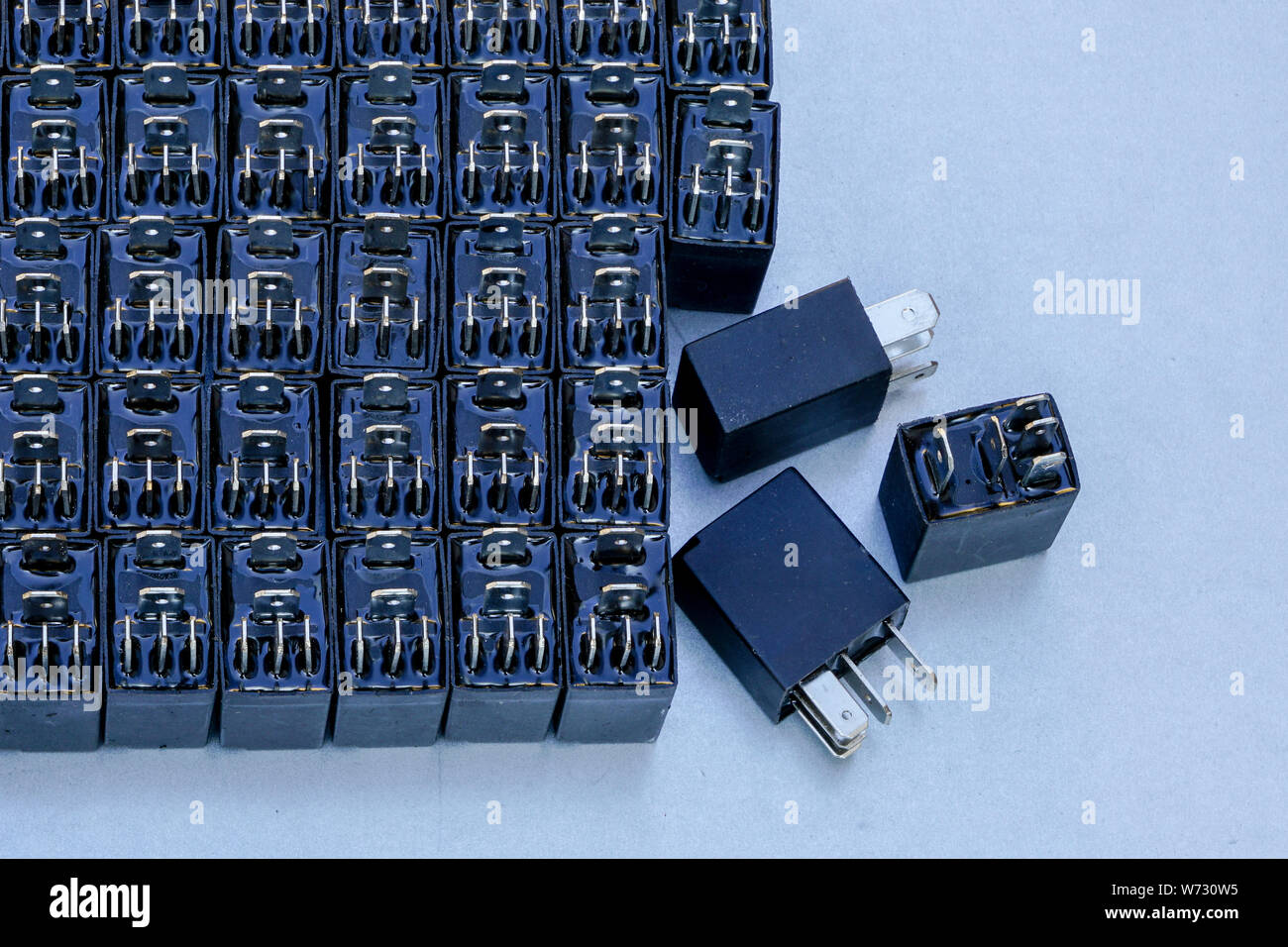 many relays with five outputs for automotive electrical systems Stock
