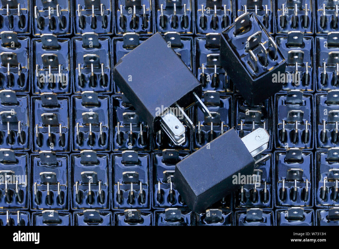 many relays with five outputs for automotive electrical systems Stock