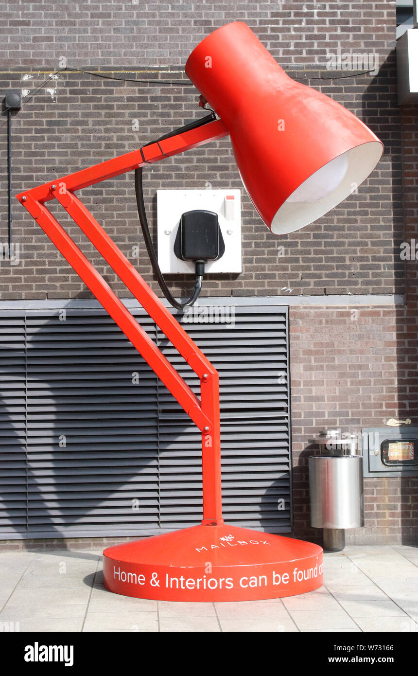 Giant red anglepoise lamp on Severn Street advertising Home & Interiors