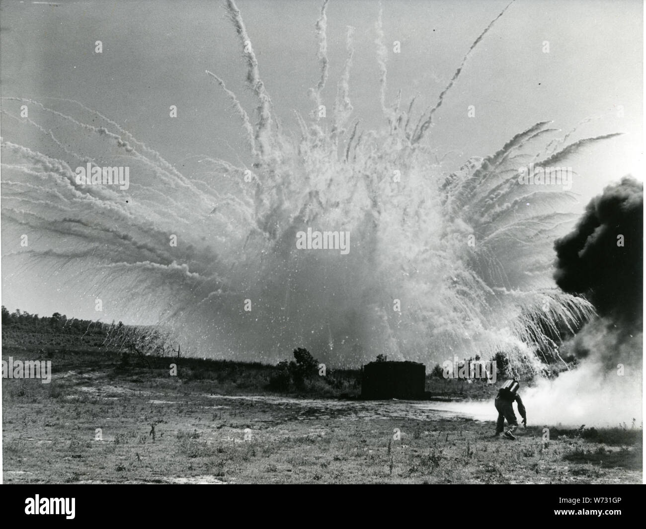 Smoke bomb explodes hires stock photography and images Alamy