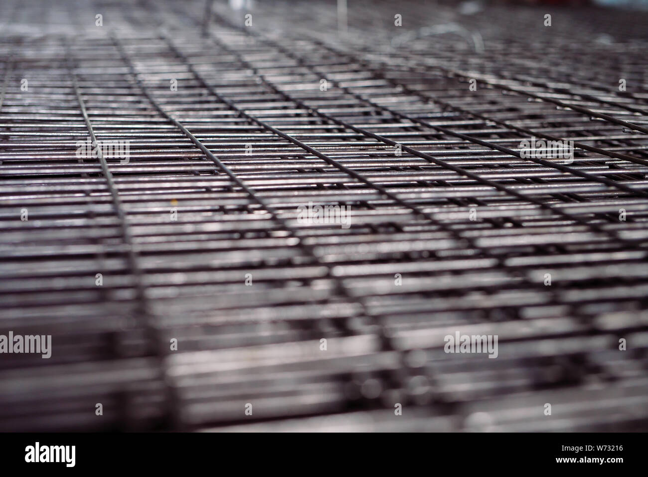 Metal grid. Heavy industry production. Metal rolling plant Stock Photo