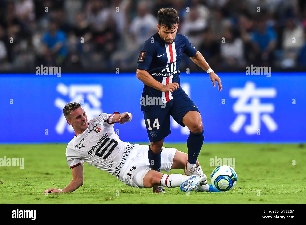 Juan Bernat Top Of Paris Saint Germain Challenges Benjamin Bourigeaud Of Stade Rennais During The Trophee Des Champions Champion S Trophy Match In Shenzhen City South China S Guangdong Province 3 August 2019 Stock Photo