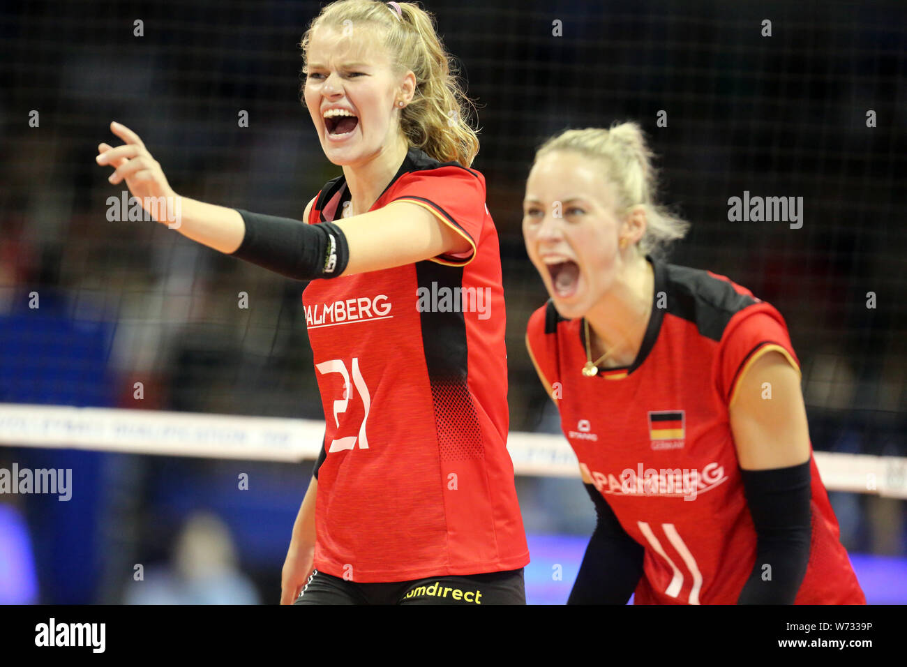 Members of Germany women's national volleyball team yell during the