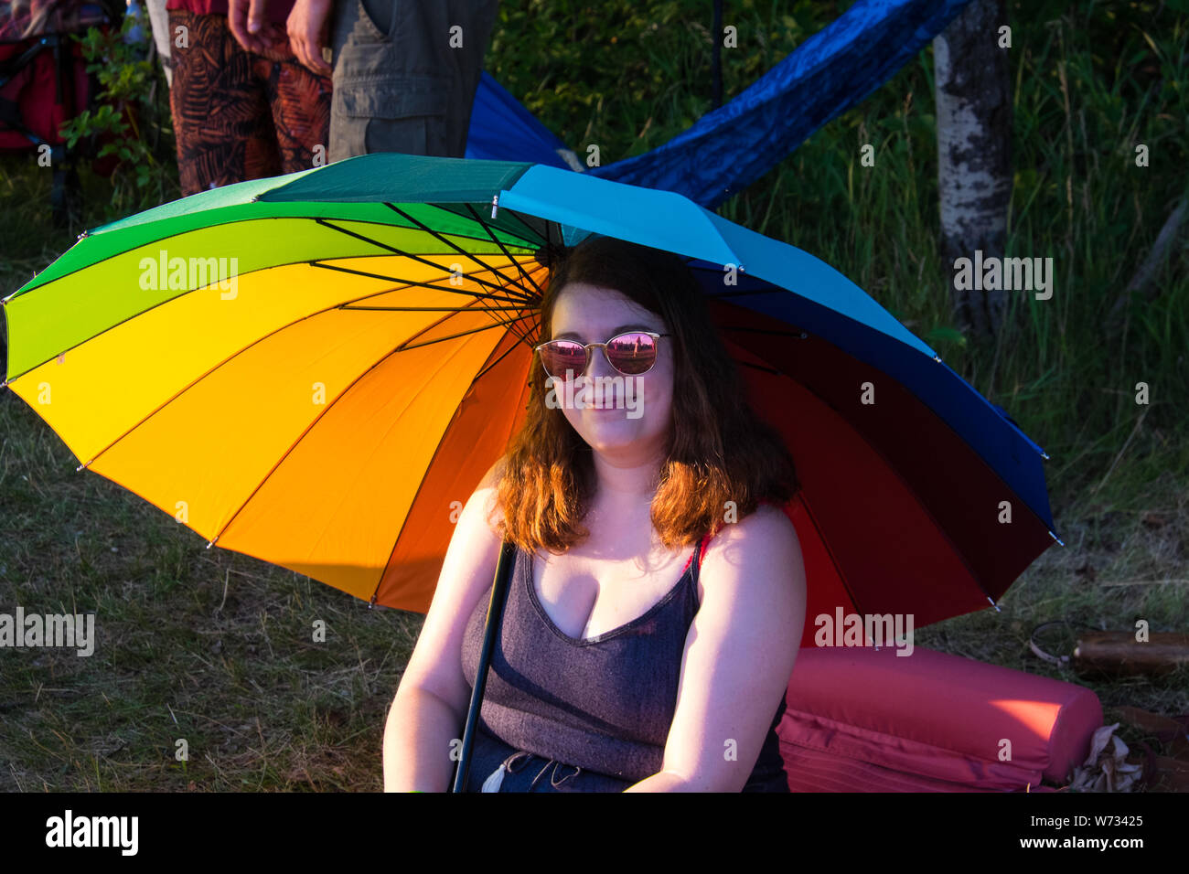 Girl Under Rainbow Umbrella Winnipeg Folk Festival 2019 Stock Photo