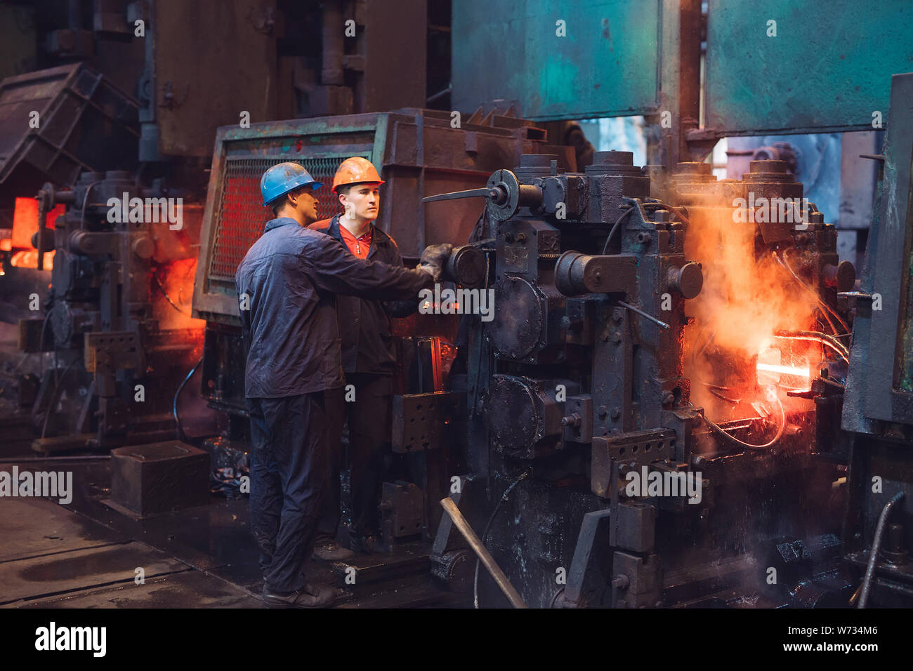 Workers in the steel mill. Metallurgical industry Stock Photo Alamy