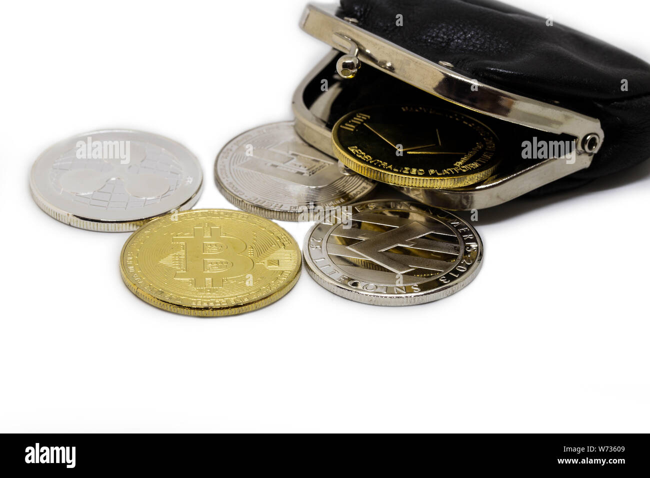 stack of cryptocurrenciesm bitcoin and altcoin together, isolated on white with black wallet Stock Photo