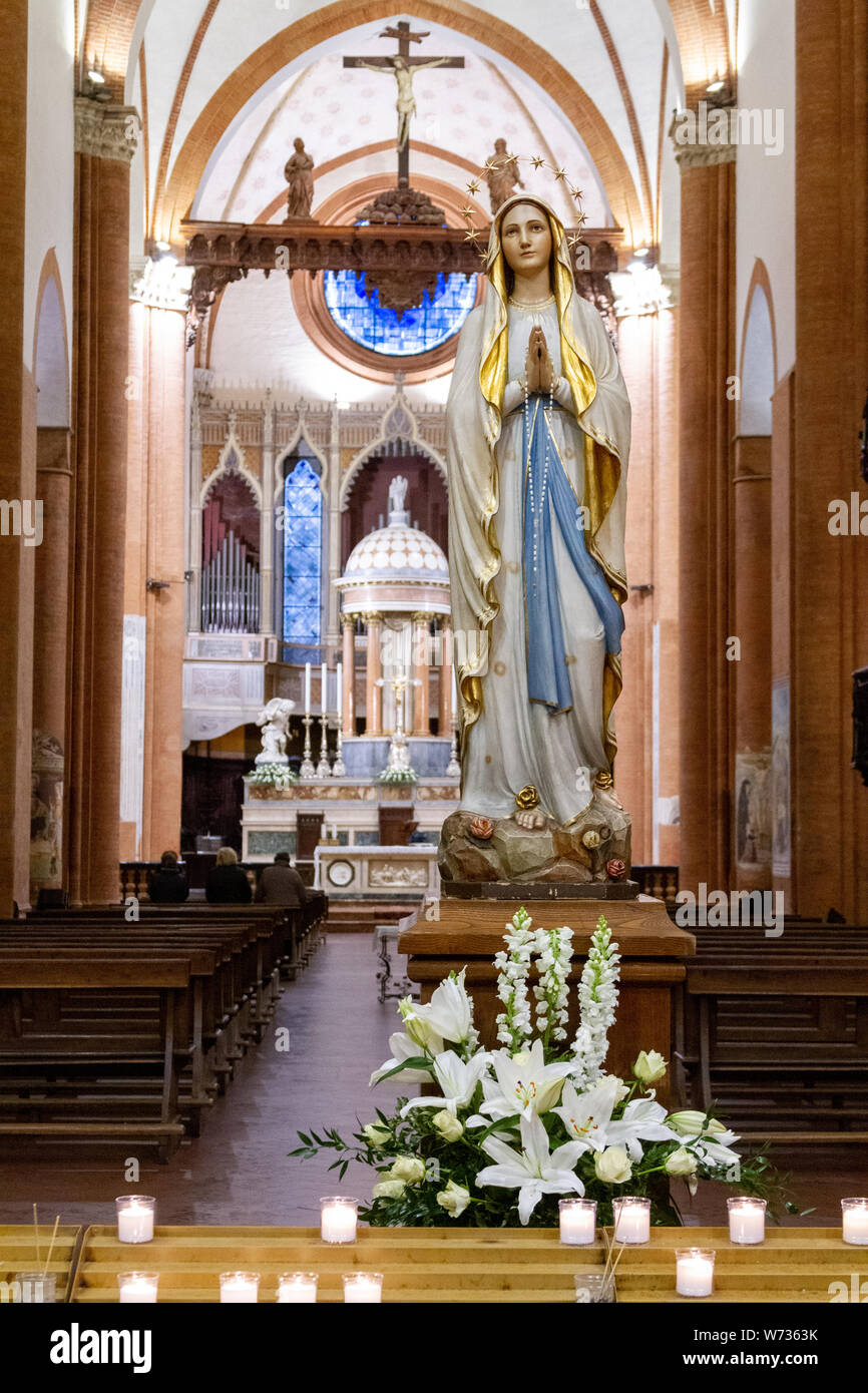 The statue of Our Lady of Lourdes in the 'Santa Maria del Carmine' church (Holy Mary of Carmel) in Pavia. Stock Photo