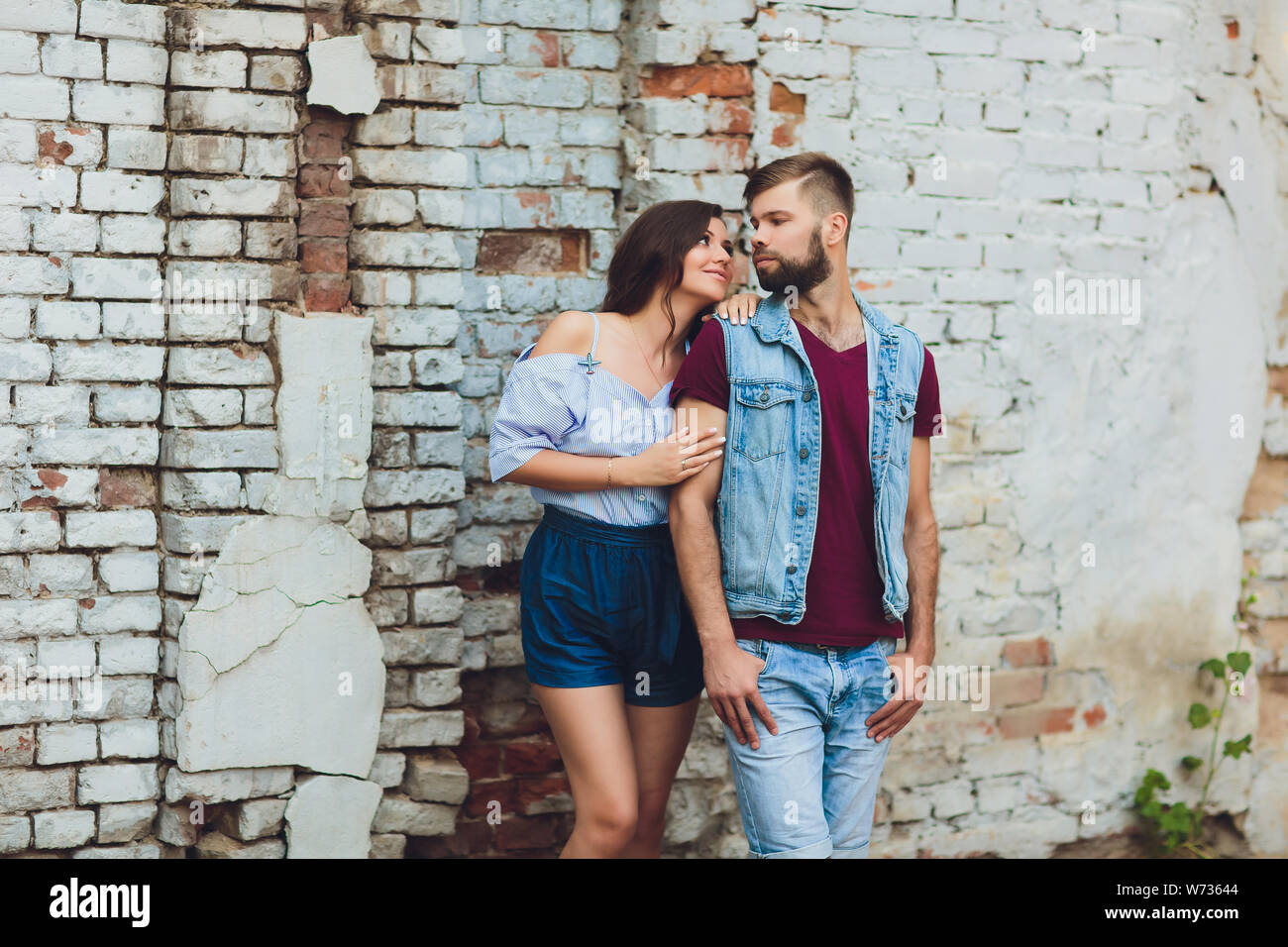 Cheerful young couple having fun and laughing together outdoors Stock ...