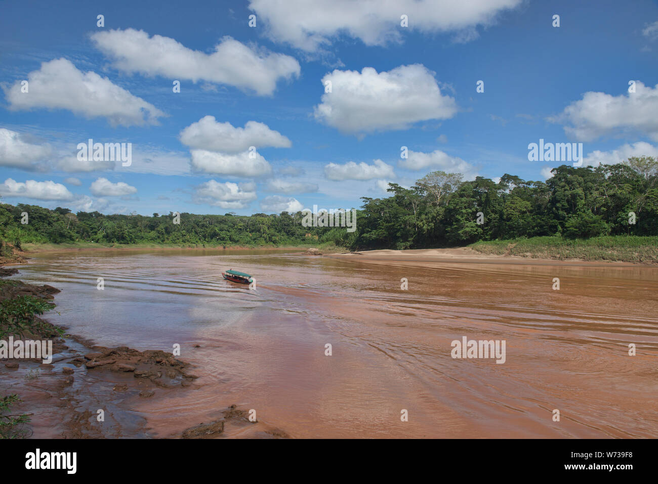 Navigating the Tambopata River, Tambopata National Reserve, Peruvian Amazon Stock Photo