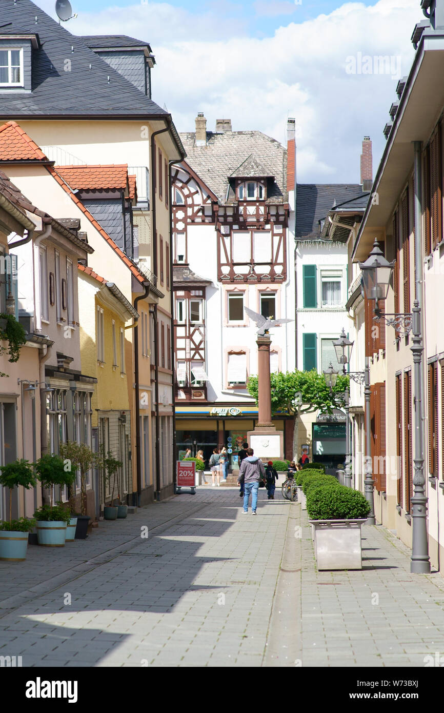 Bad Homburg, Germany - June 09, 2019: A narrow alley with old historic houses overlooking the Waisenhaus Square on June 09, 2019 in Bad Homburg. Stock Photo