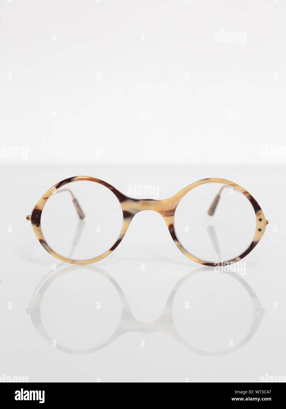 A Vintage Pair of Tortoiseshell Spectacles or Eyeglasses Stock Photo