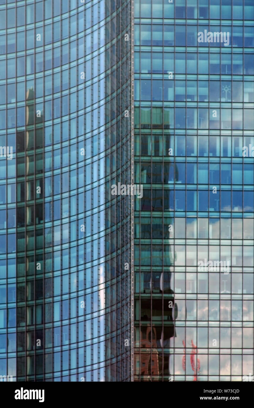 The modern mirror facade of a skyscraper or office building Stock Photo ...