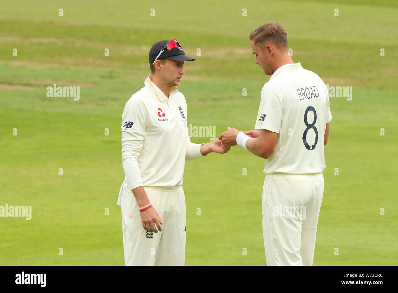 BIRMINGHAM, ENGLAND. 04 AUGUST 2019: Joe Root and Stuart Broad of England during day 3 of the 1st Specsavers Ashes Test Match, at Edgbaston Cricket Ground, Birmingham, England. Stock Photo