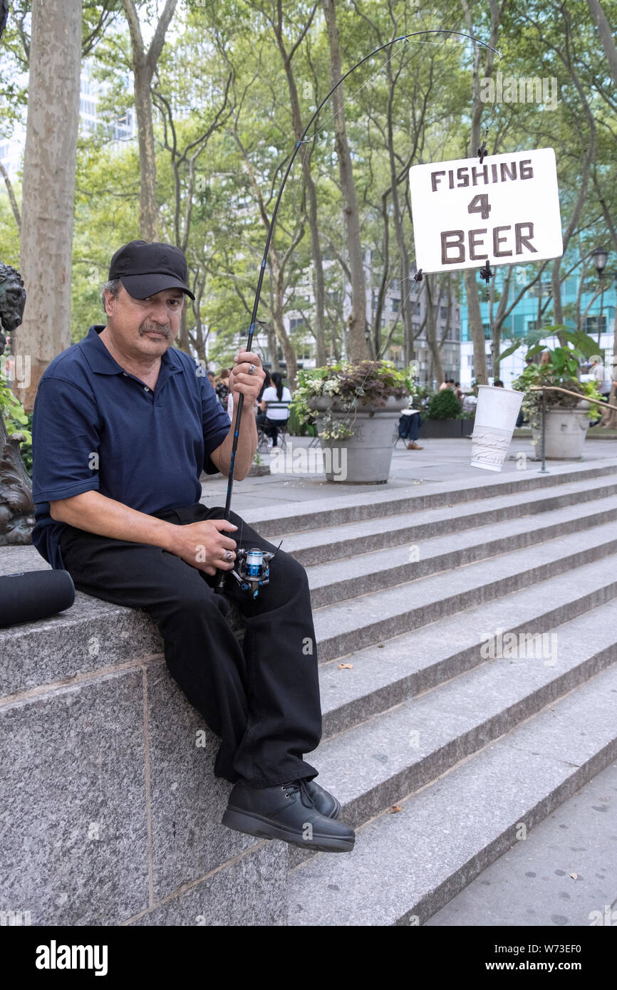 FISHING FOR BEER. A funny panhandler in Midtown Manhattan soliciting ...