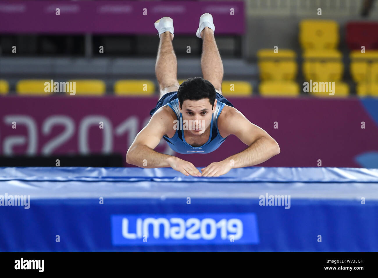 Lima, Peru. 4th Aug, 2019. LUCAS ADORNO from Argentina prepares to bounce on his stomach on the trampoline during the competition held in the Polideportivo Villa El Salvador in Lima, Peru. Credit: Amy Sanderson/ZUMA Wire/Alamy Live News Stock Photo