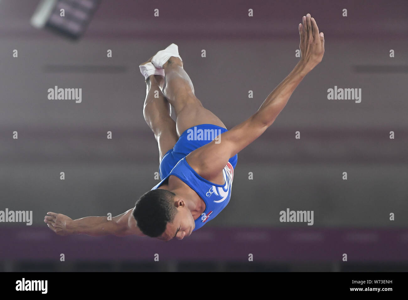 Lima, Peru. 4th Aug, 2019. JUNIOR MATEO from the Dominican Republic flips upside down during the competition held in the Polideportivo Villa El Salvador in Lima, Peru. Credit: Amy Sanderson/ZUMA Wire/Alamy Live News Stock Photo