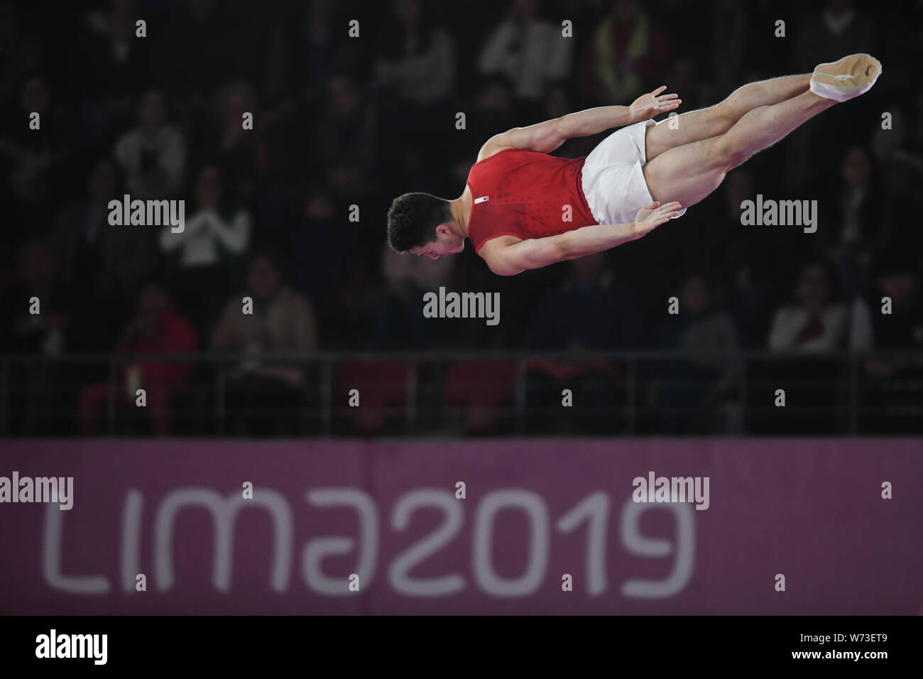 Lima, Peru. 4th Aug, 2019. JEREMY CHARTIER from Canada flips upside down during the competition held in the Polideportivo Villa El Salvador in Lima, Peru. Credit: Amy Sanderson/ZUMA Wire/Alamy Live News Stock Photo
