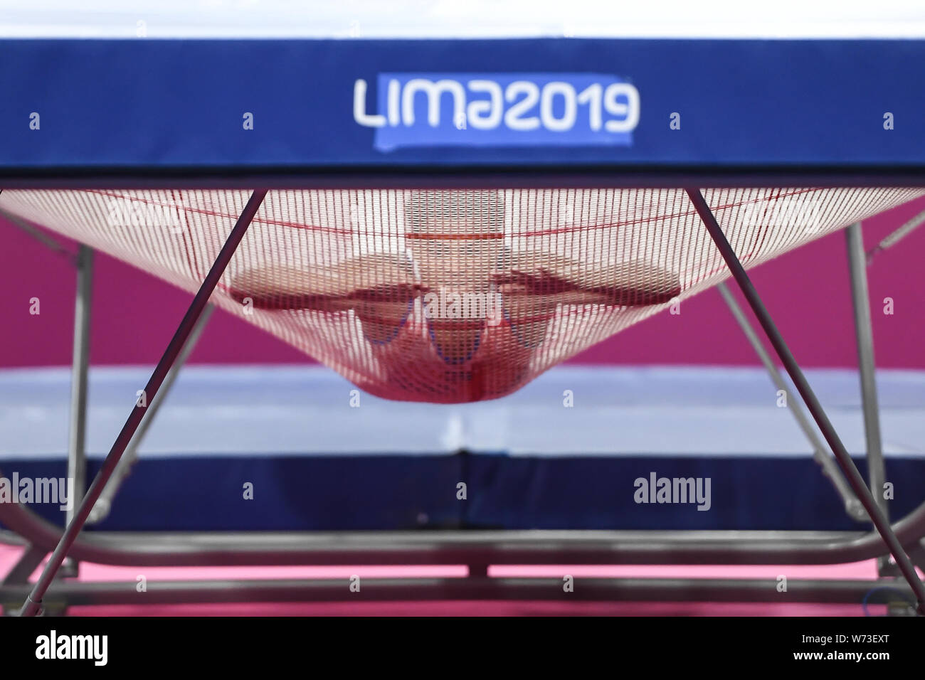 Lima, Peru. 4th Aug, 2019. ALEXANDER RODRIGUEZ from Cuba bounces off the trampoline on his stomach during the competition held in the Polideportivo Villa El Salvador in Lima, Peru. Credit: Amy Sanderson/ZUMA Wire/Alamy Live News Stock Photo