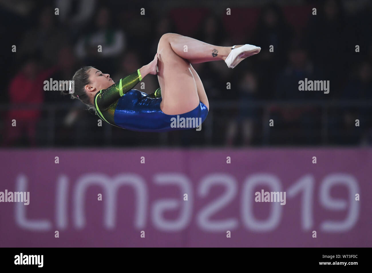 Lima, Peru. 4th Aug, 2019. ALICE GOMES from Brazil flips upside down during the competition held in the Polideportivo Villa El Salvador in Lima, Peru. Credit: Amy Sanderson/ZUMA Wire/Alamy Live News Stock Photo