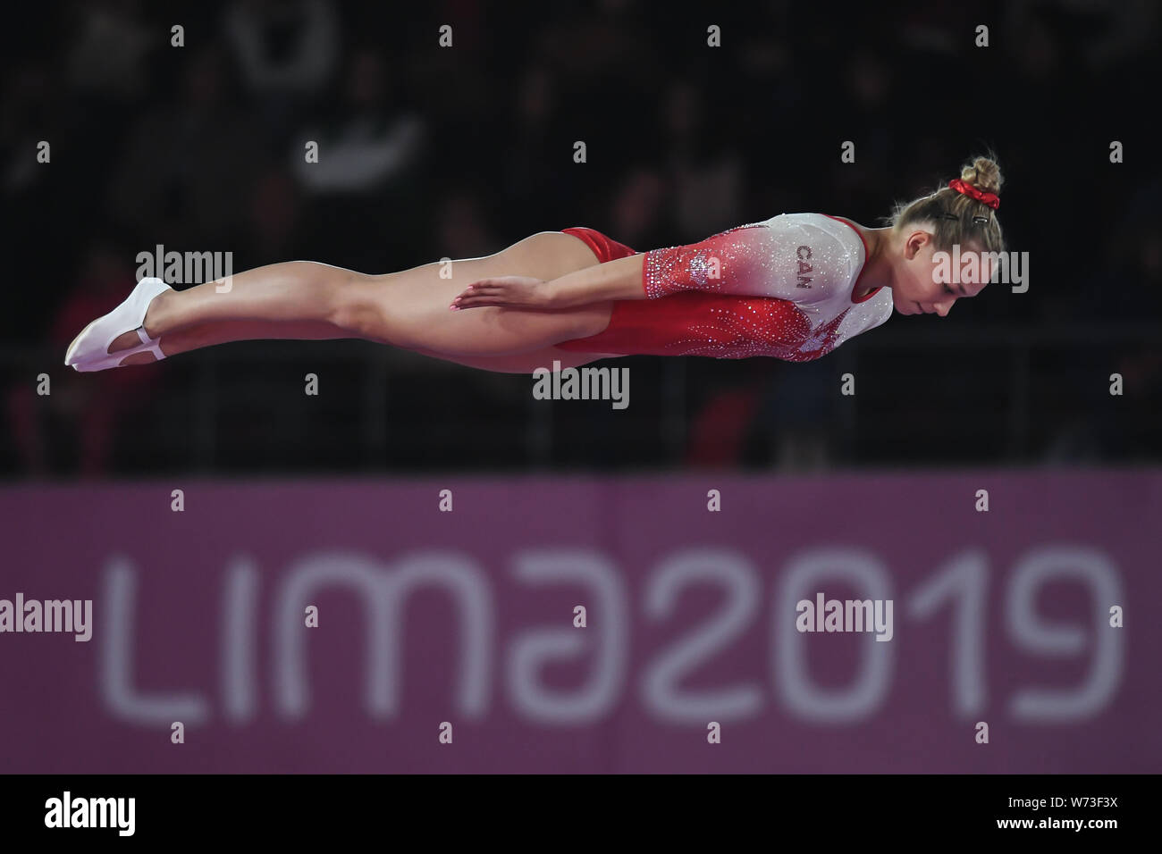 Lima, Peru. 4th Aug, 2019. SARAH MILETTE from Canada flips in a layed out position during the competition held in the Polideportivo Villa El Salvador in Lima, Peru. Credit: Amy Sanderson/ZUMA Wire/Alamy Live News Stock Photo