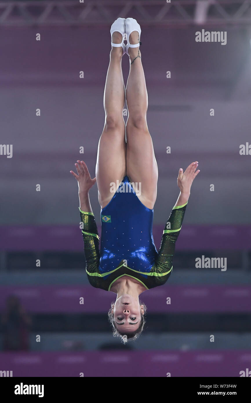 Lima, Peru. 4th Aug, 2019. MARYANN GOMEZ from Brazil flips upside down during the competition held in the Polideportivo Villa El Salvador in Lima, Peru. Credit: Amy Sanderson/ZUMA Wire/Alamy Live News Stock Photo