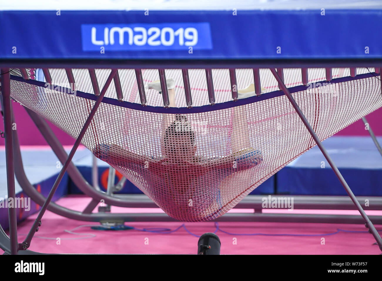 Lima, Peru. 4th Aug, 2019. MARA COLOMBO from Argentina bounces on her stomach on the trampoline during the competition held in the Polideportivo Villa El Salvador in Lima, Peru. Credit: Amy Sanderson/ZUMA Wire/Alamy Live News Stock Photo