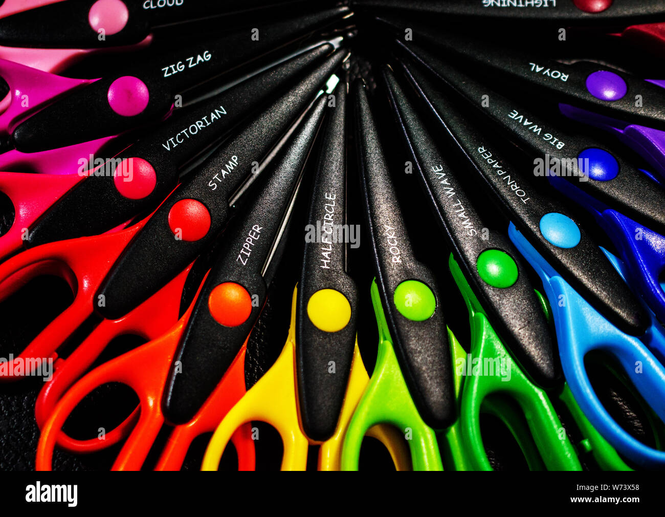 Rainbow of Plastic Decorative Edge Scissors Stock Photo