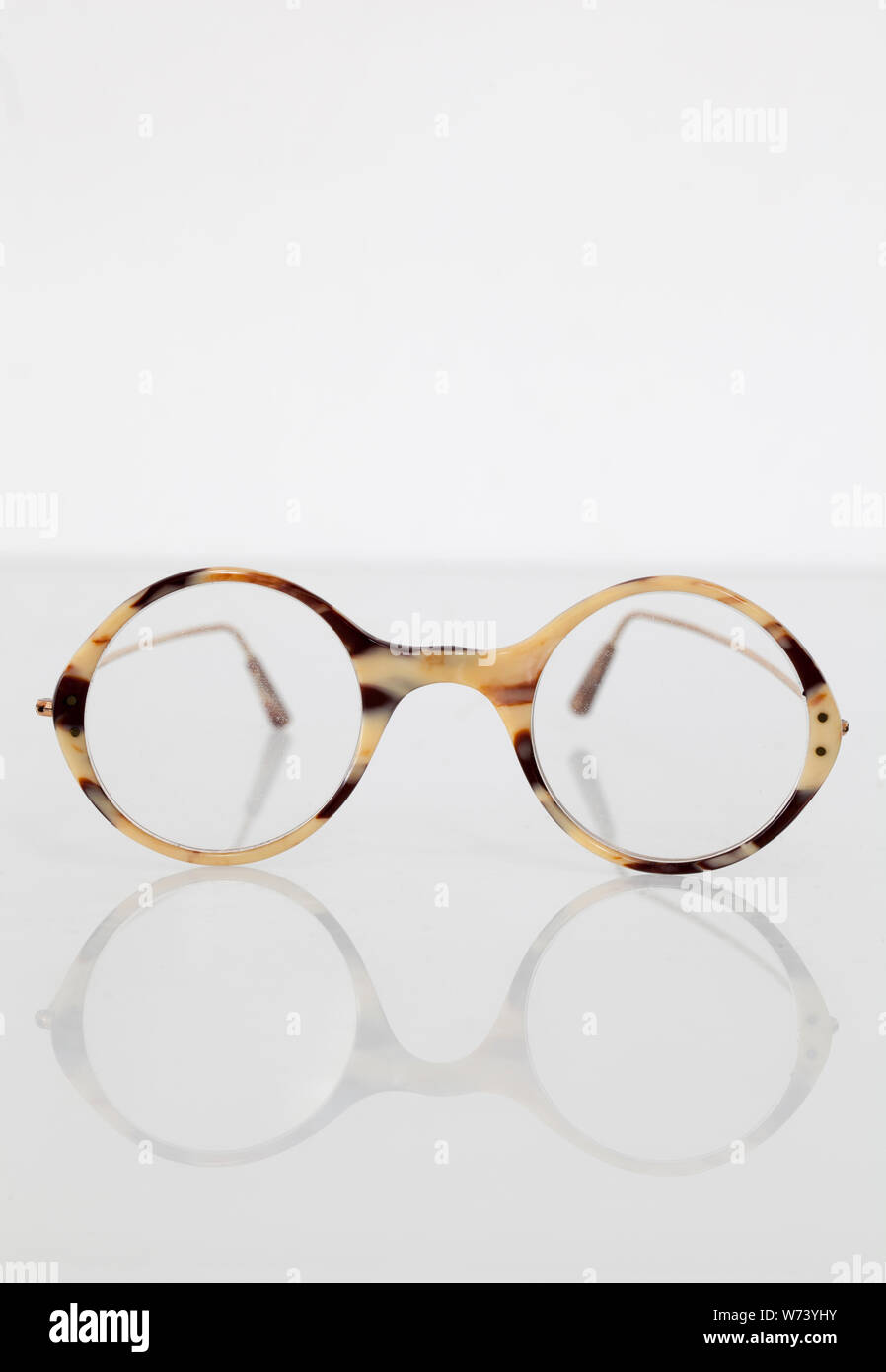 A Vintage Pair of Tortoiseshell Spectacles or Eyeglasses Stock Photo