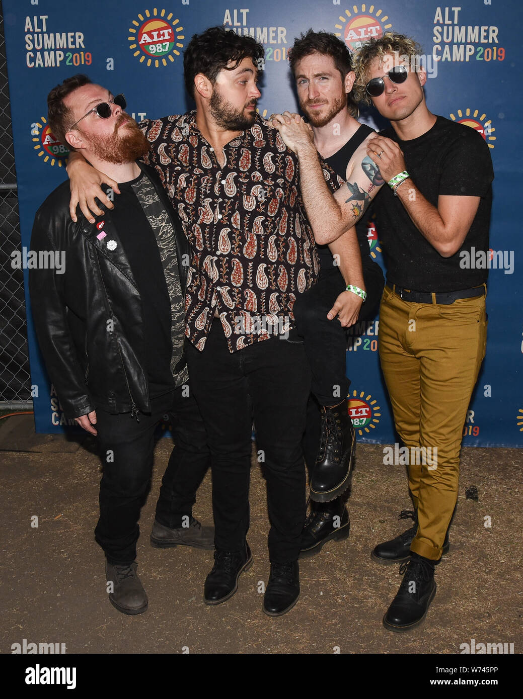 Long Beach, California, USA. 3rd Aug 2019. Sean Waugaman, Nicholas Petricca, Eli Maiman and Kevin Ray of the band Walk the Moon pose for a portrait backstage ALT 98.7 Summer Camp at the Queen Mary Event Park in Long Beach on August 3, 2019. Credit: The Photo Access/Alamy Live News Stock Photo
