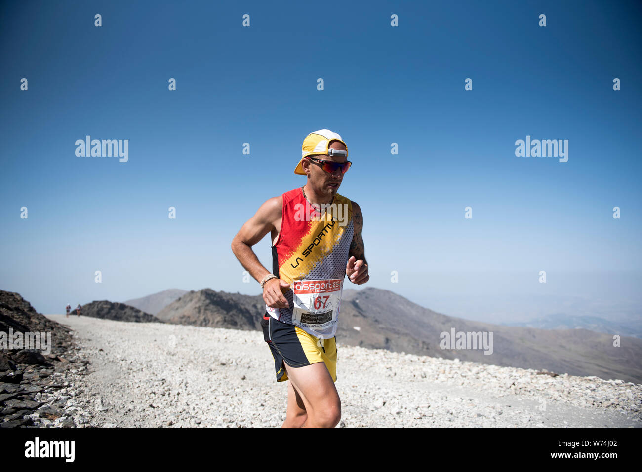 Competitor runs during the race held Sierra Nevada.The Granada-Pico Veleta international ascent one of toughest ultra-endurance in the world held in Sierra Nevada. 50 kilometers from the city