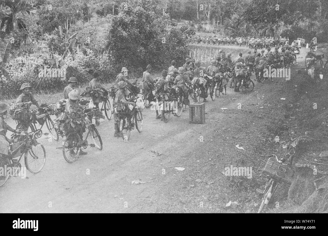 Imperial Japanese Army bicycle force, British Malaya, going towards Singapore, 1942. Private Collection. Stock Photo