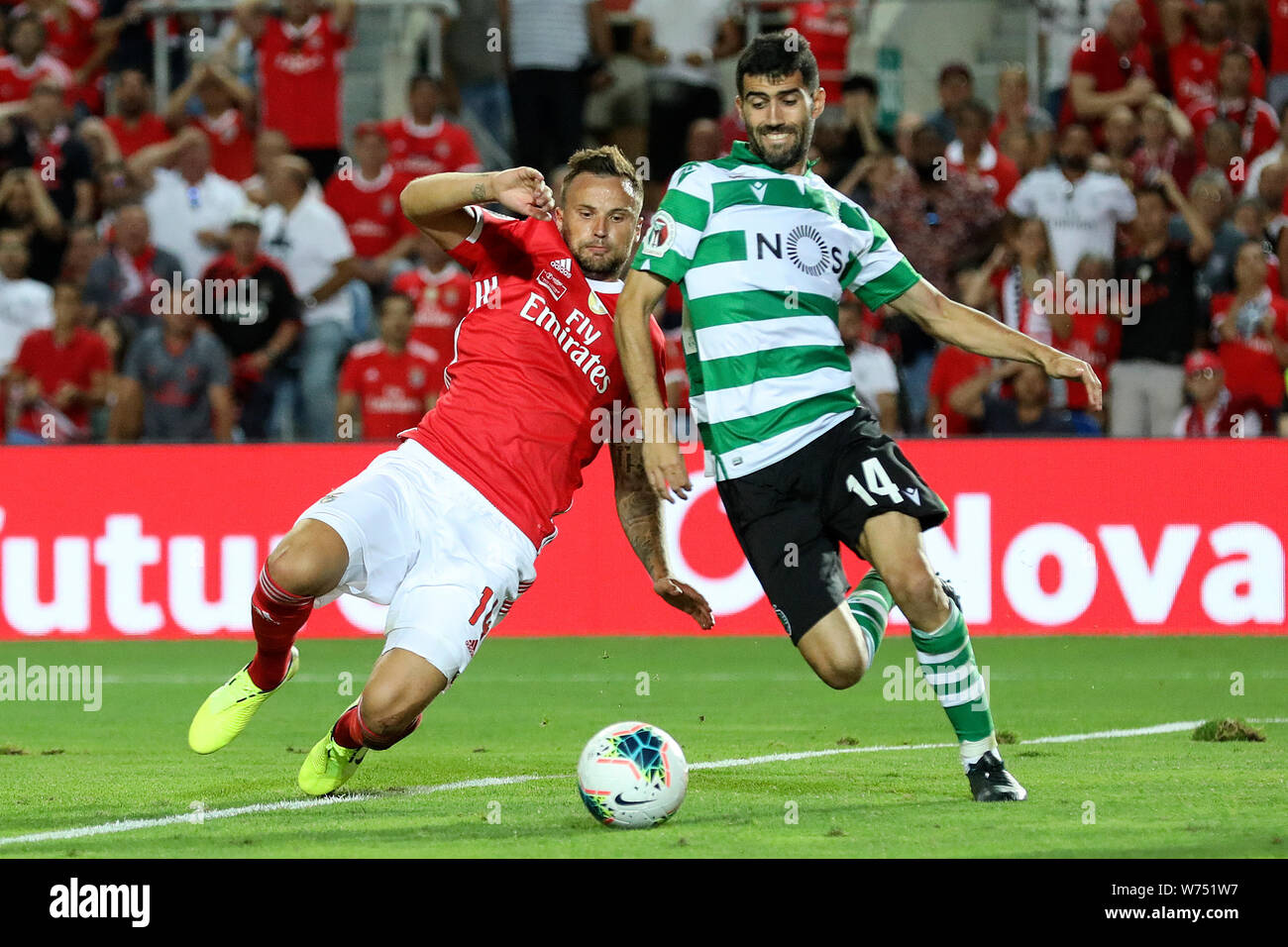 Lisbon, Portugal. 04th Aug, 2019. Haris Seferovic of SL Benfica (L) vies for the ball with Luís Neto of Sporting CP (R) during the Final Cândido de Oliveira SuperCup 2019 football match between SL Benfica vs Sporting CP.(Final score: SL Benfica 5 - 0 Sporting CP) Credit: SOPA Images Limited/Alamy Live News Stock Photo