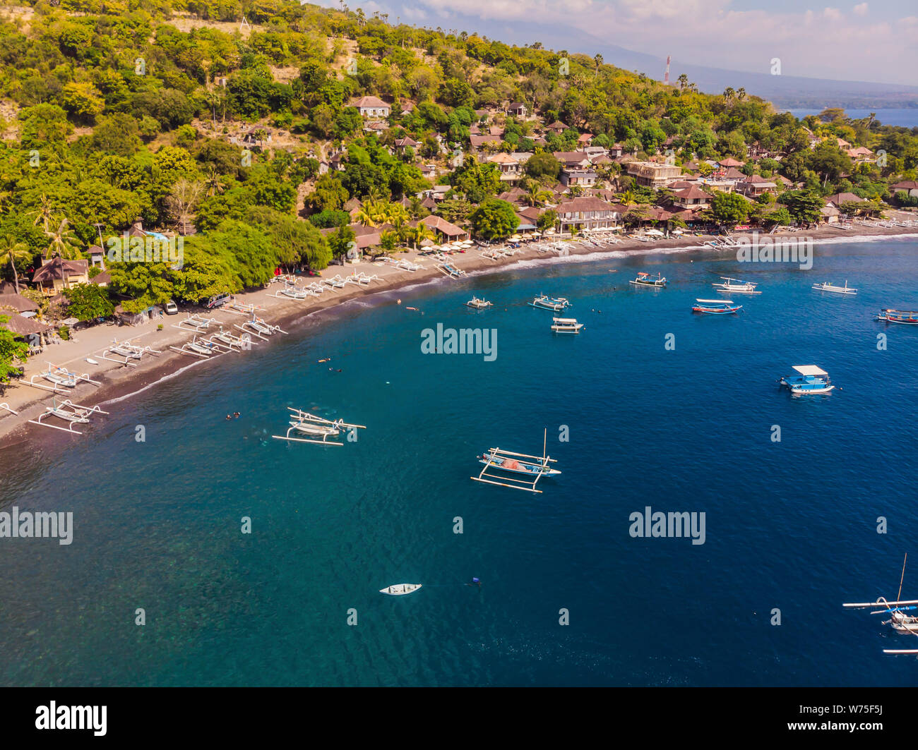 Jemeluk Bay, Amed. Amed is fast becoming a popular tourist destination in Bali, Indonesia. Set in the North-East of Bali, it is a home to excellent Stock Photo