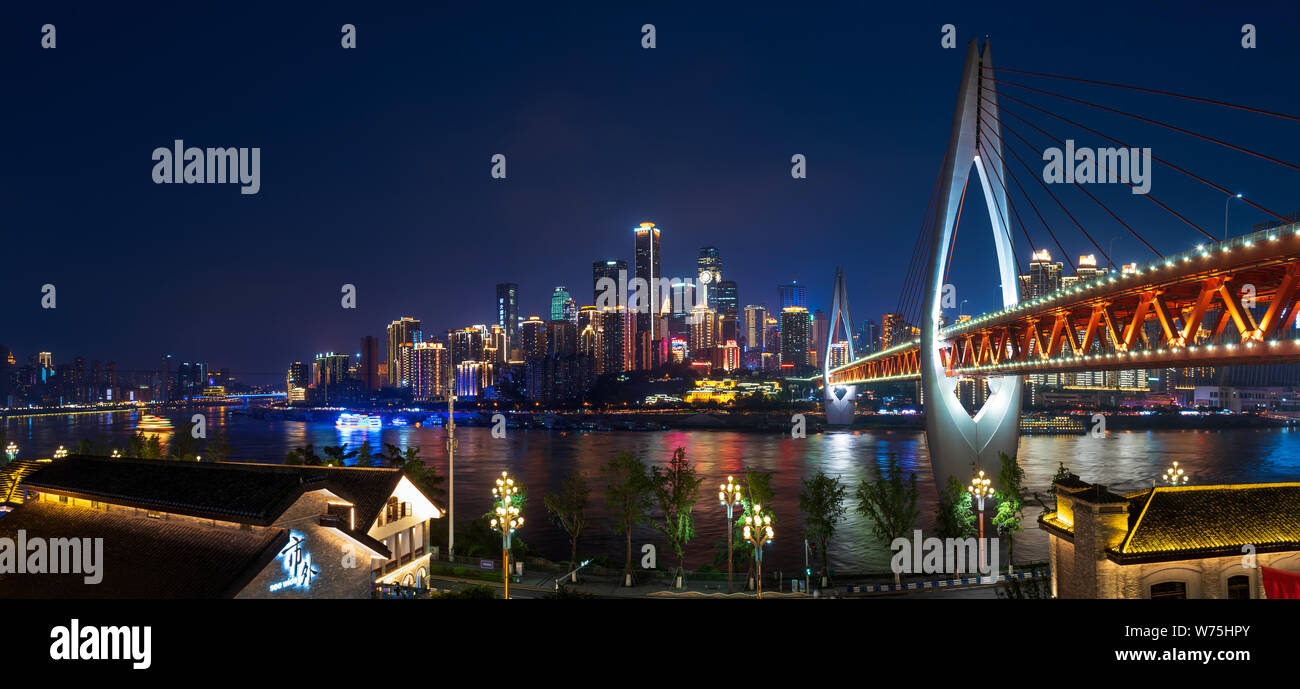 Chongqing, China - July 24, 2019: Panoramic view of Chongqing skyline and Chaotianmen bridge over Yangtze river in China Stock Photo