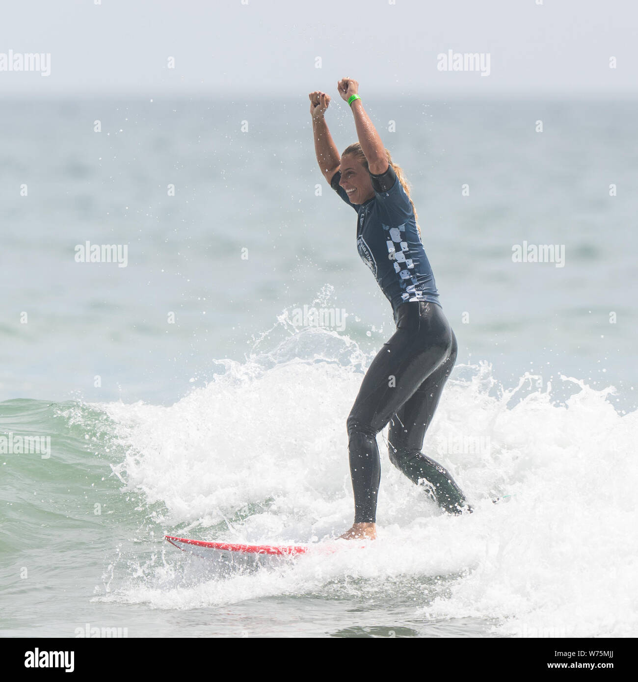 Orange County, USA. 4th Aug, 2019. Sage Erickson of the United States  celebrates during the women's final of Vans US Open of Surfing at  Huntington Beach, California, the United States, on Aug.