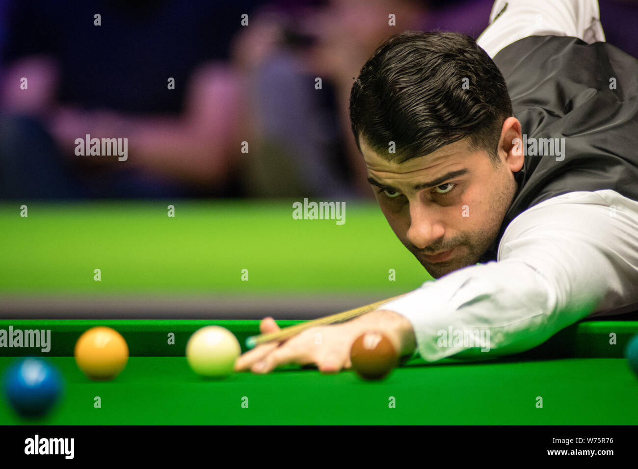 Michael Georgiou Of Cyprus Plays A Shot To Ronnie O Sullivan Of