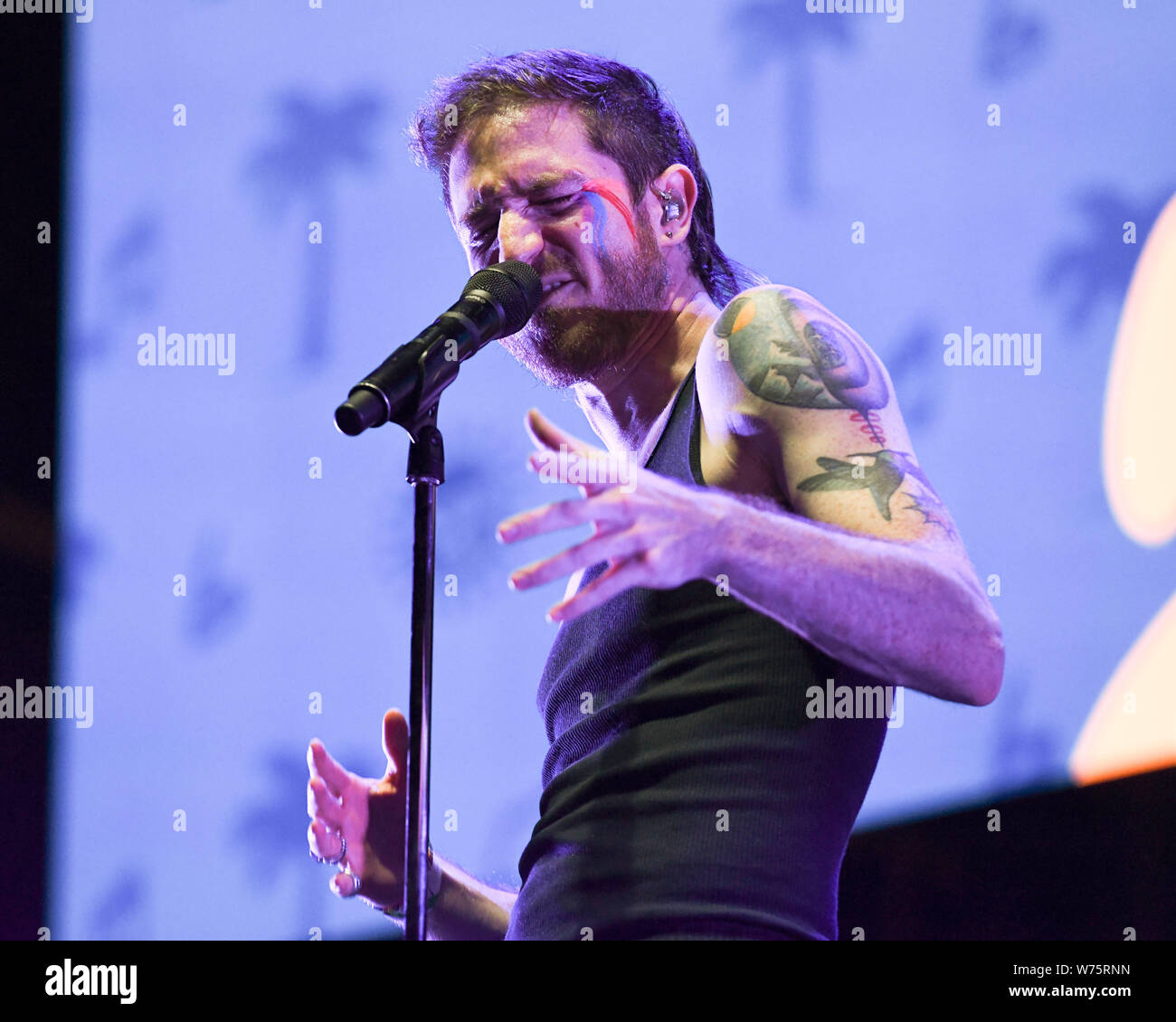 Nicholas Petricca of Walk The Moon performs at ALT 98.7 Summer Camp at the Queen Mary in Long Beach on August 3, 2019. performs at ALT 98.7 Summer Camp at the Queen Mary in Long Beach on August 3, 2019. Stock Photo