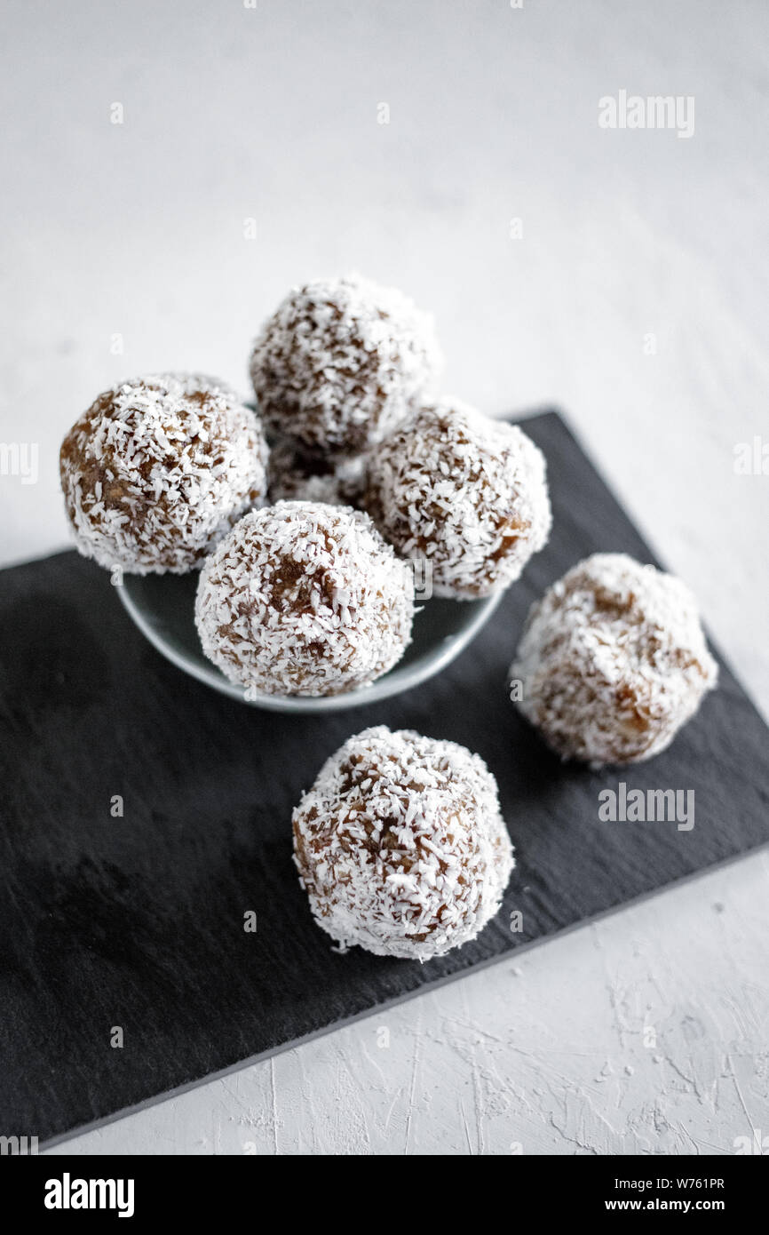 Homemade energy balls with coconut. Healthy food for children and vegan