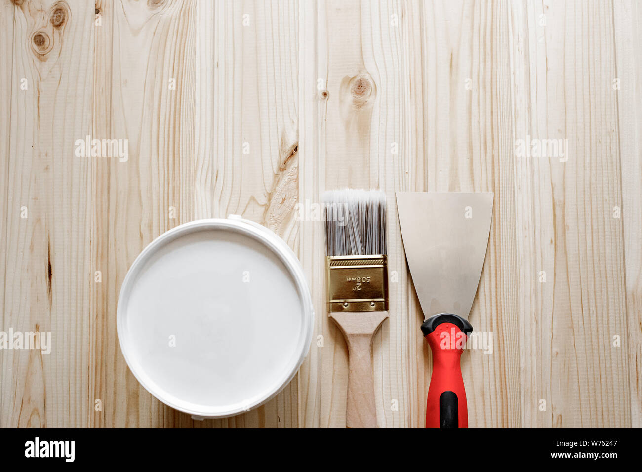 Home Repair and Building Concept. Spatula, Putty Paste, Paint Brush, on