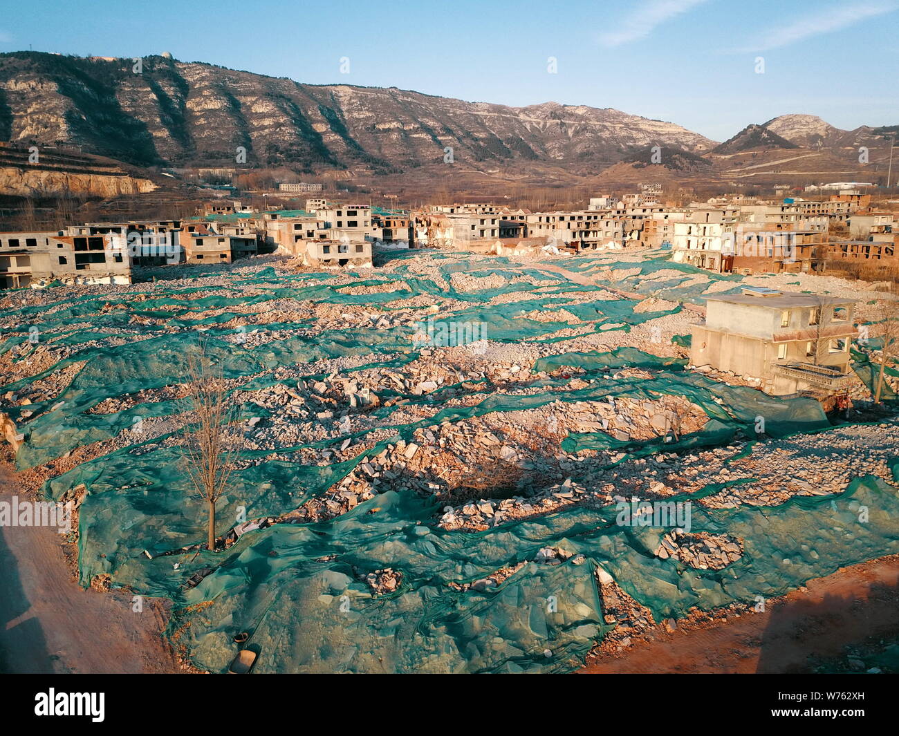 Aerial view of a 700-year-old village, Dajiangou village, almost razed to the ground due to renovation project of local government in Ji'nan city, eas Stock Photo