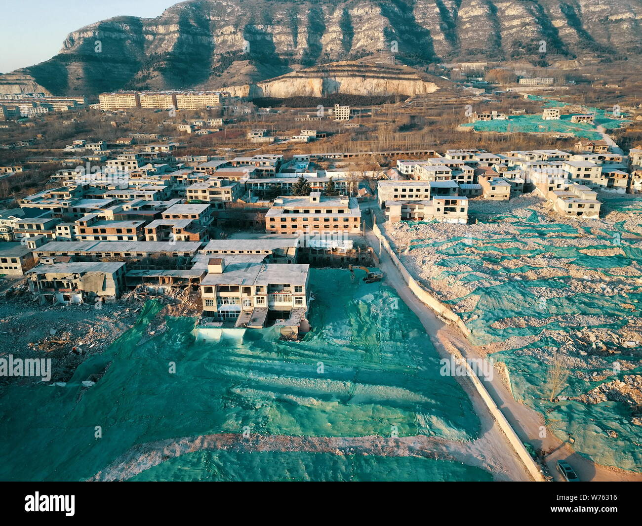 Aerial view of a 700-year-old village, Dajiangou village, almost razed to the ground due to renovation project of local government in Ji'nan city, eas Stock Photo