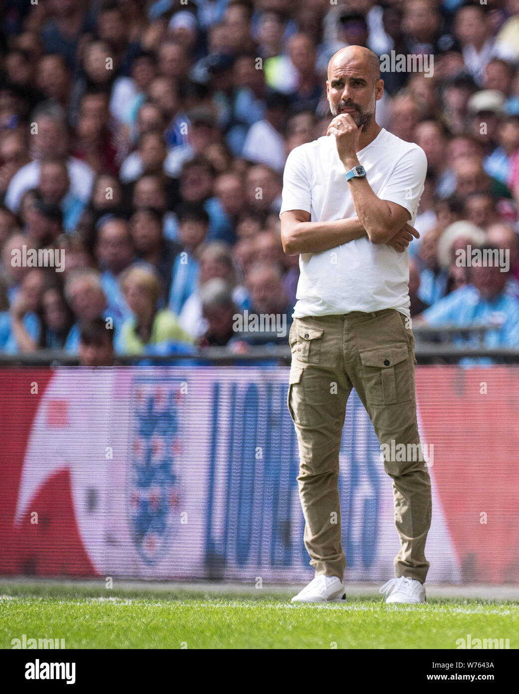 LONDON, ENGLAND - AUGUST 04: manager Pep Guardiola of Manchester City looks  on during the FA Community Shield match between Liverpool and Manchester  City at Wembley Stadium on August 4, 2019 in